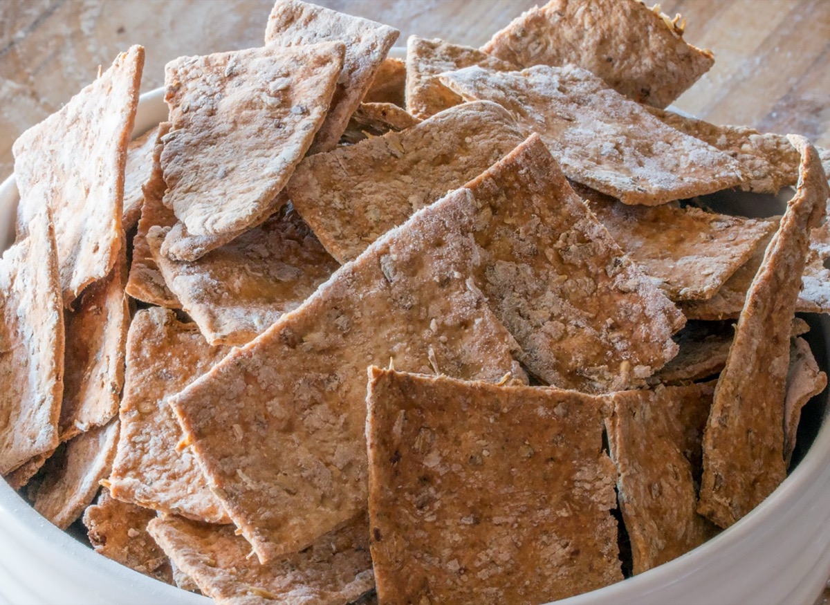 Wholegrain crackers and baked snacks made with dried brewers' grain as flour replacement